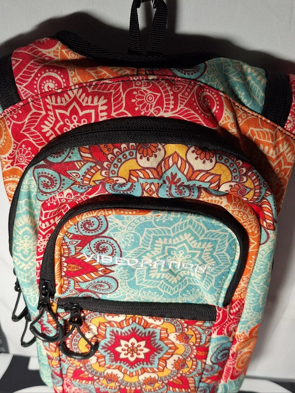 Vibedration Hydration Backpack w/o bladder -turquoise/orange pattern - Used